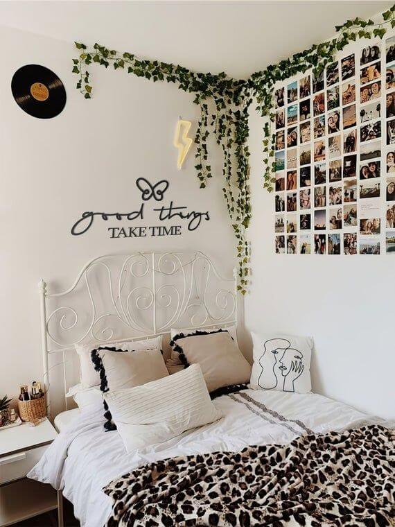 cute bedroom with ivy vines and neon lights on the wall