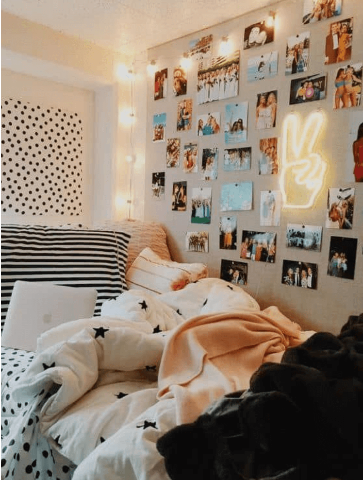 cozy room with wall collage and neon lights