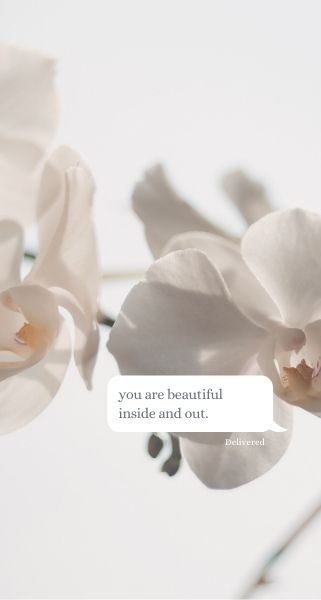 white orchids and inspirational message