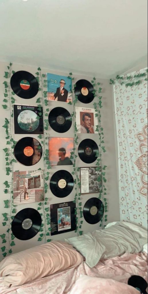 bedroom wall decorated with vinyl records