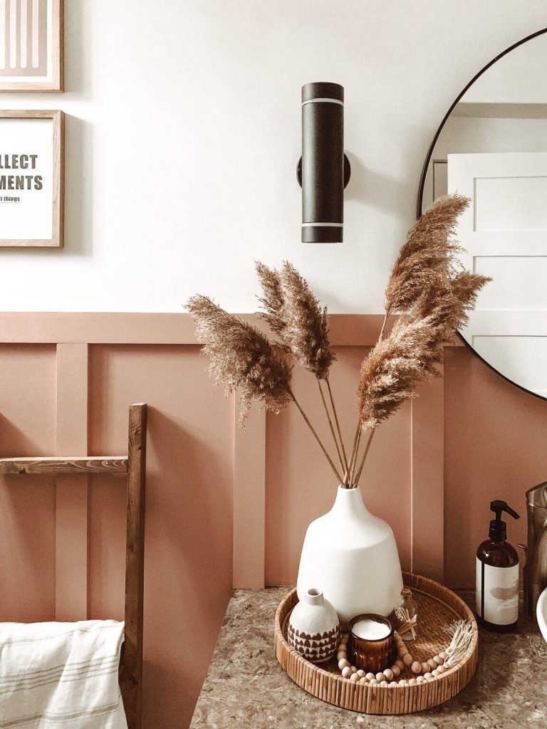 neutral small bathroom with brown pampas grass decor