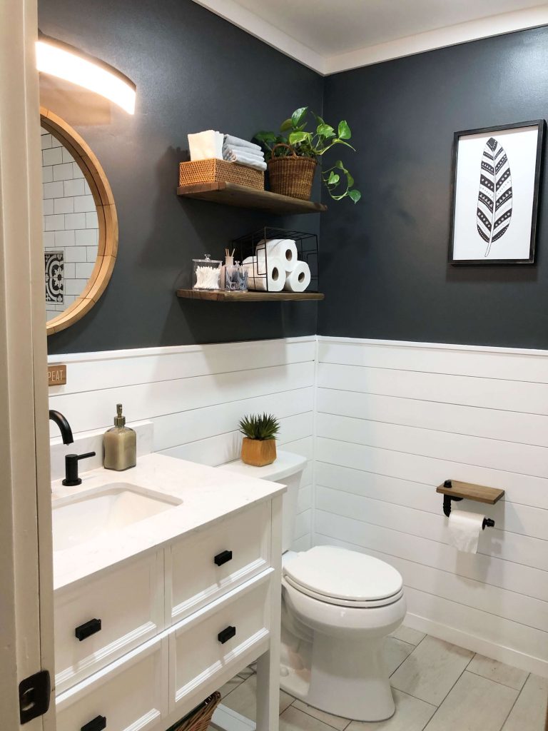 small bathroom with black wall