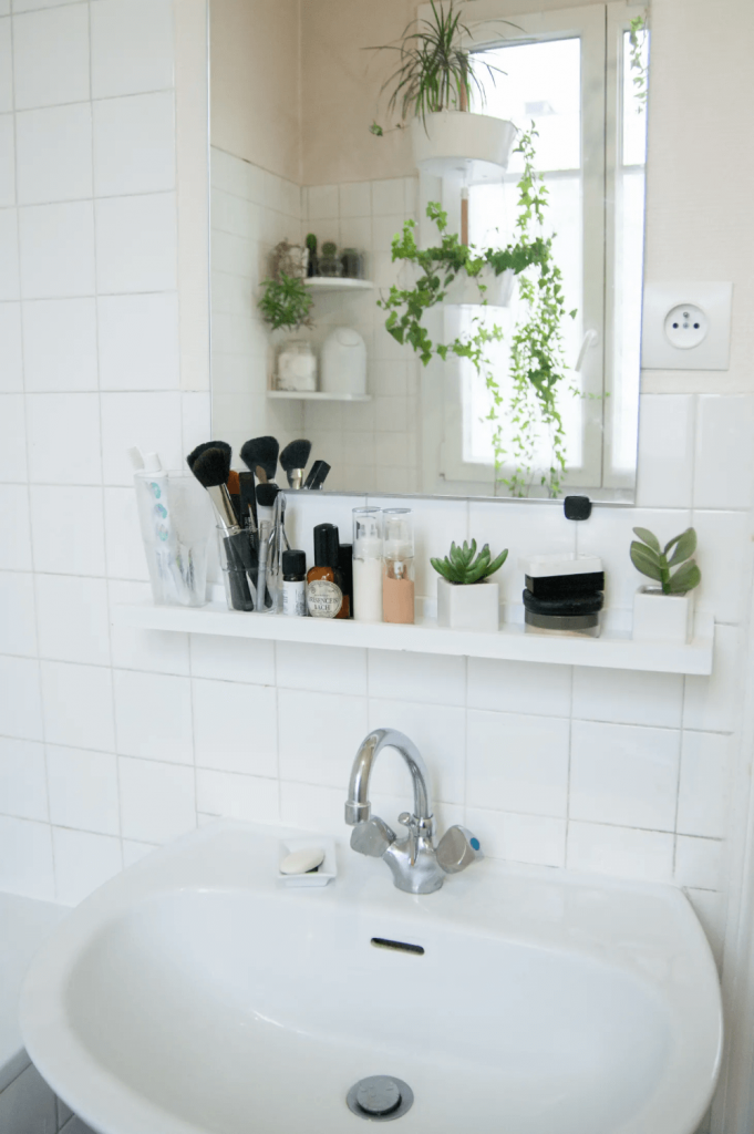 picture ledge under mirror in small bathroom