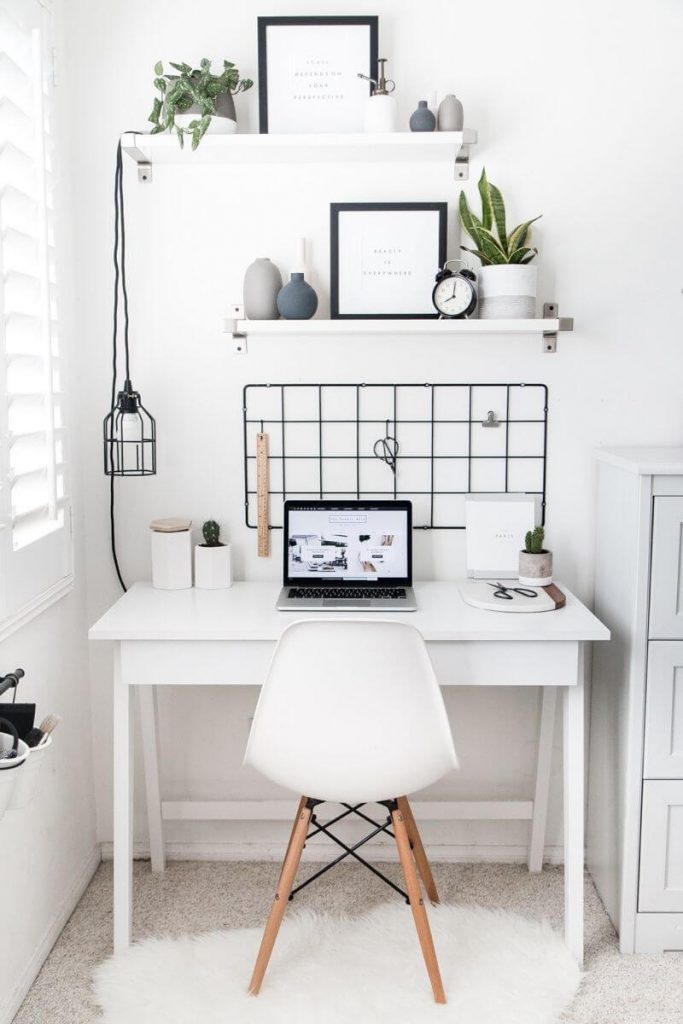 floating shelves in a minimalist small office