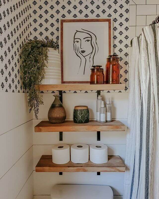 small bathroom with wall mounted floating shelves