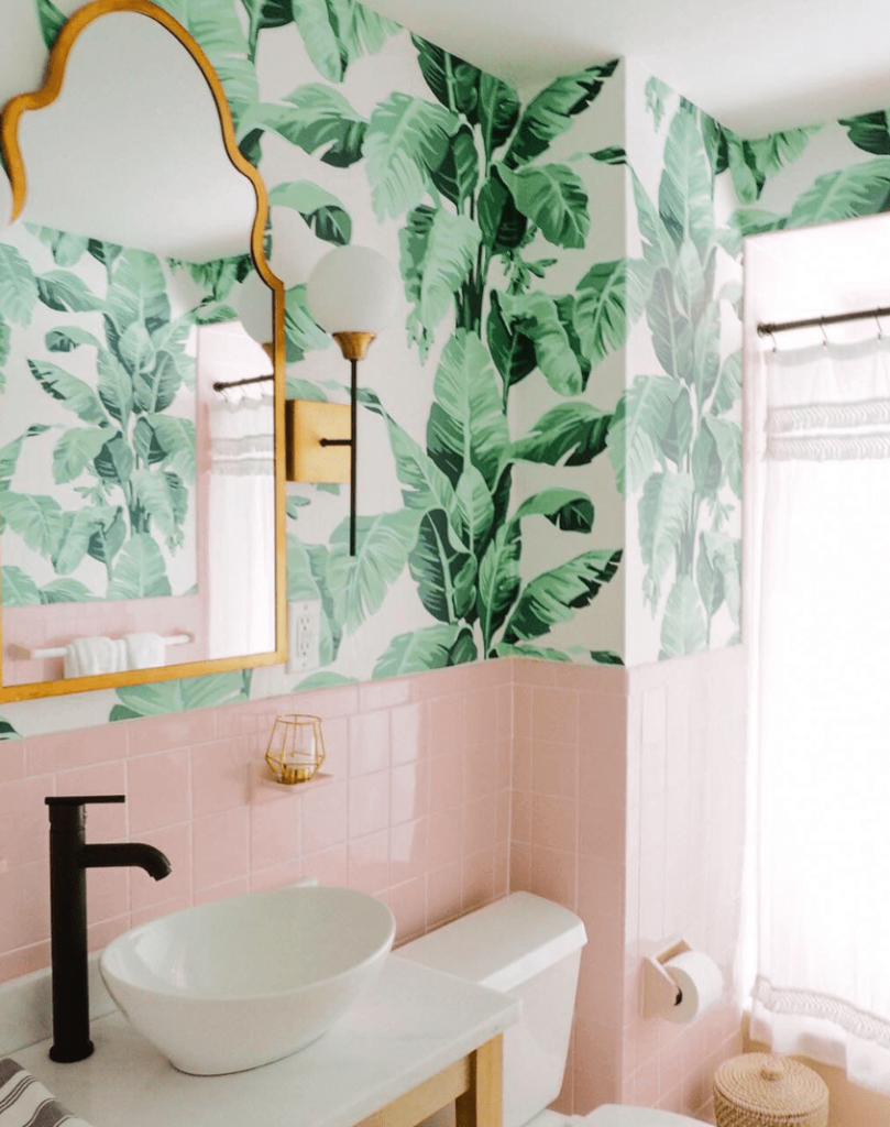 small bathroom with pink and tropical wallpaper color scheme