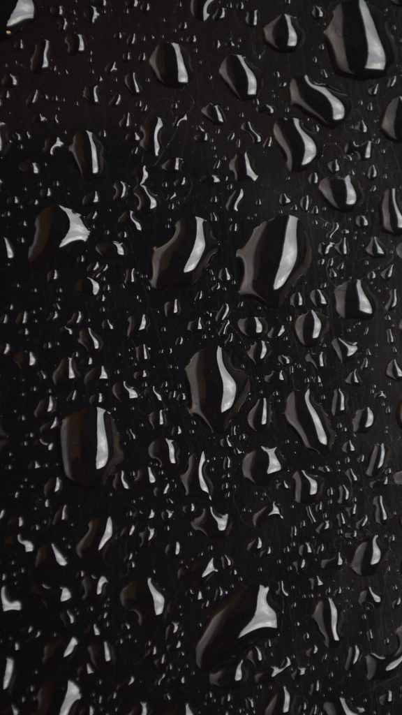 black wallpaper with rain drops