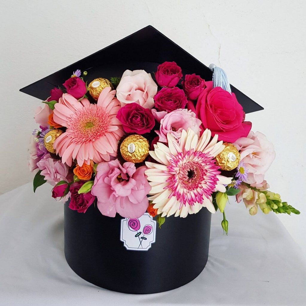 flower centerpiece graduation with grad cap