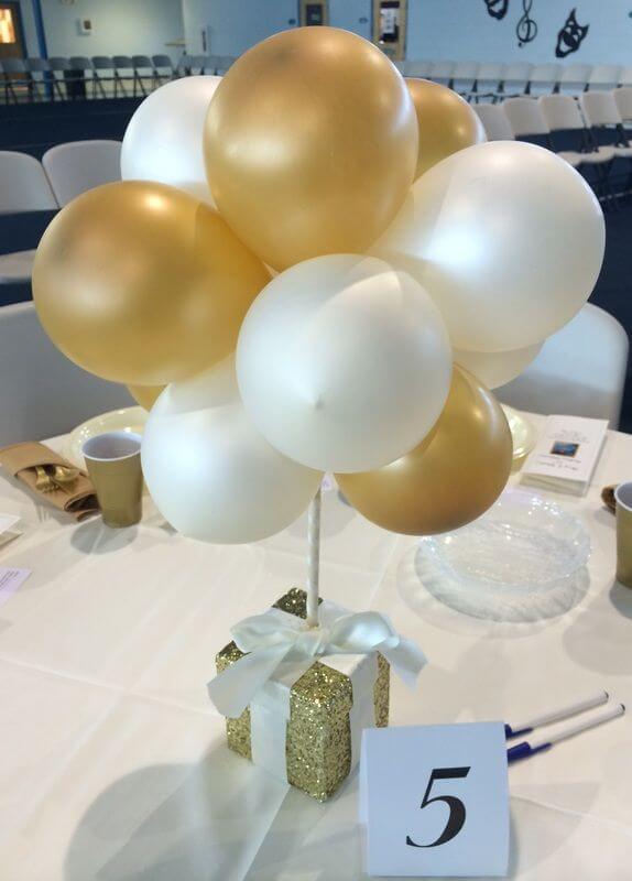 graduation table centerpiece with balloons