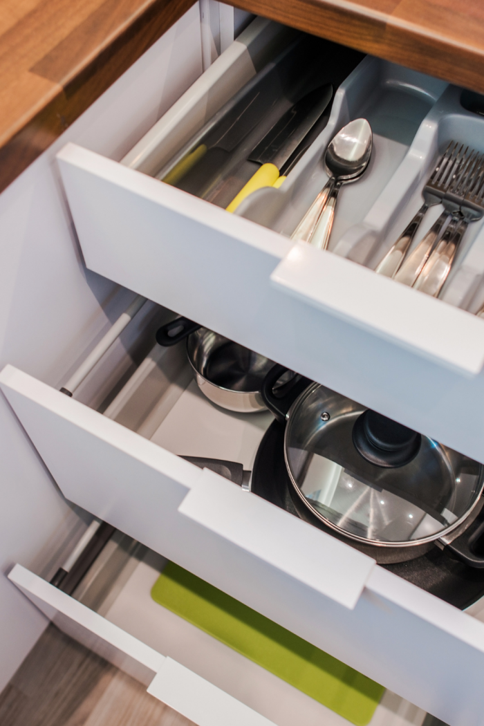 how to organize pots and pans in cabinet