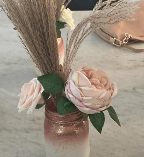 simple mason jar centerpiece with roses