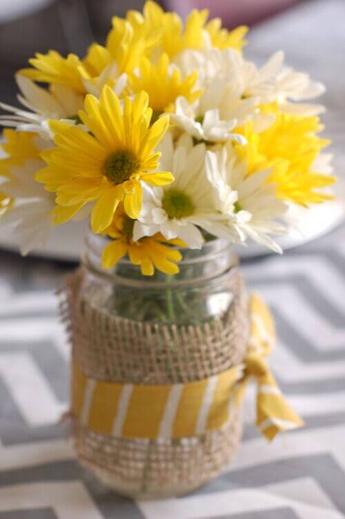 burlap mason jar centerpieces with yellow flower