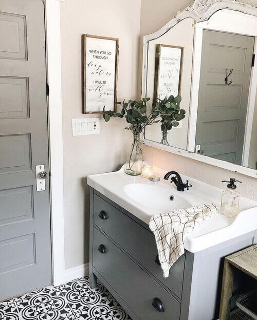 green bathroom with countertop decor