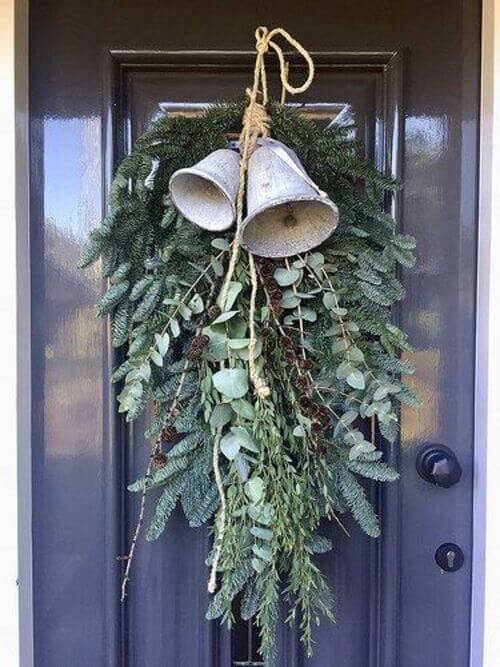 door decor with bell and wreath