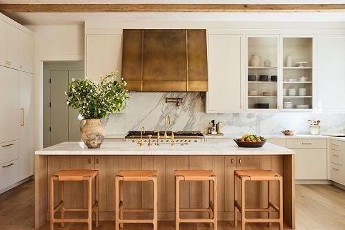kitchen with gold hood vents