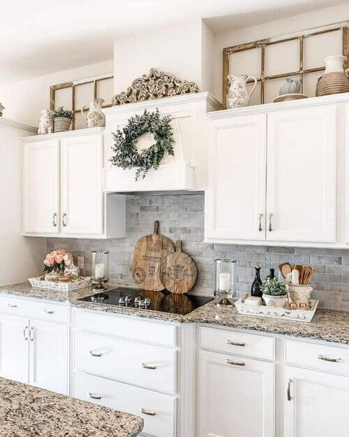 how to decorate above cabinet space in kitchen