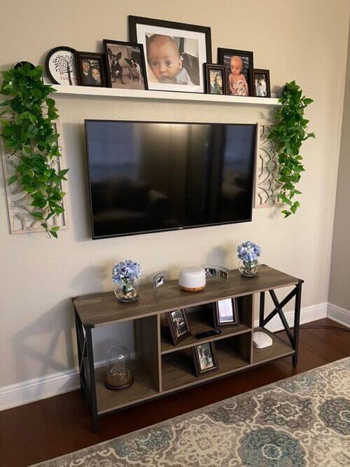 how to decorate around a tv on a large wall