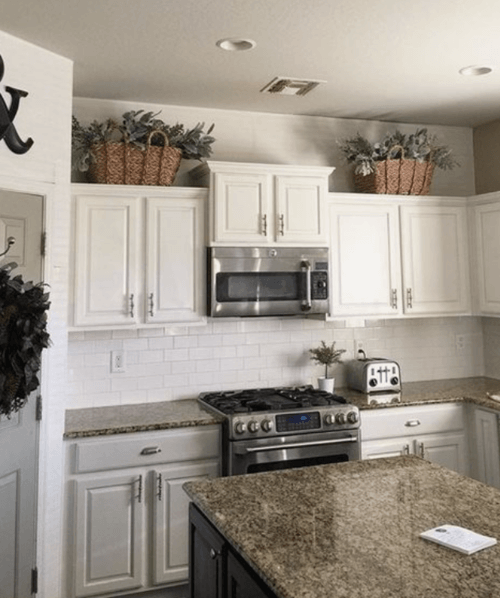 how to decorate on top of kitchen cabinets