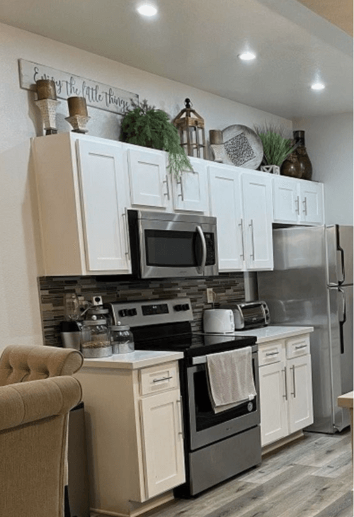how to decorate over the kitchen cabinets