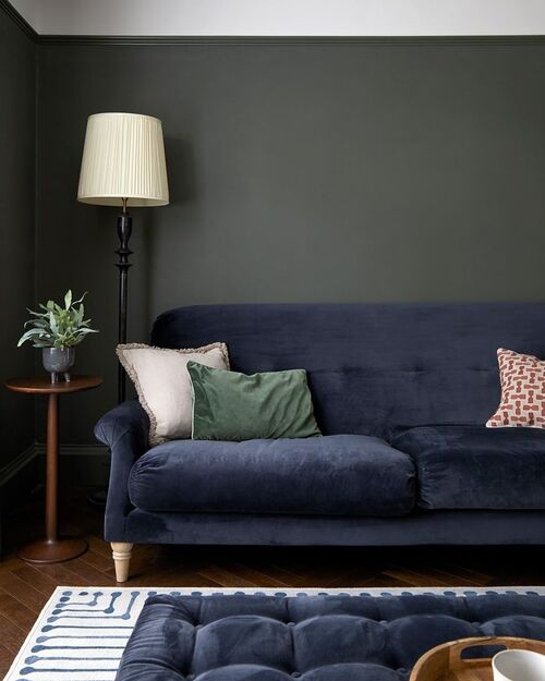living room with blue velvet upholstery