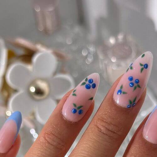 neutral nails with blue art